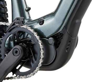 Close-up of a bicycle chain and gear system on a white background