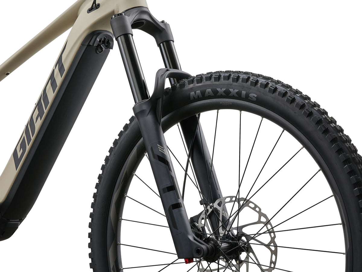 Close-up of a mountain bike with a Giant frame on a white background