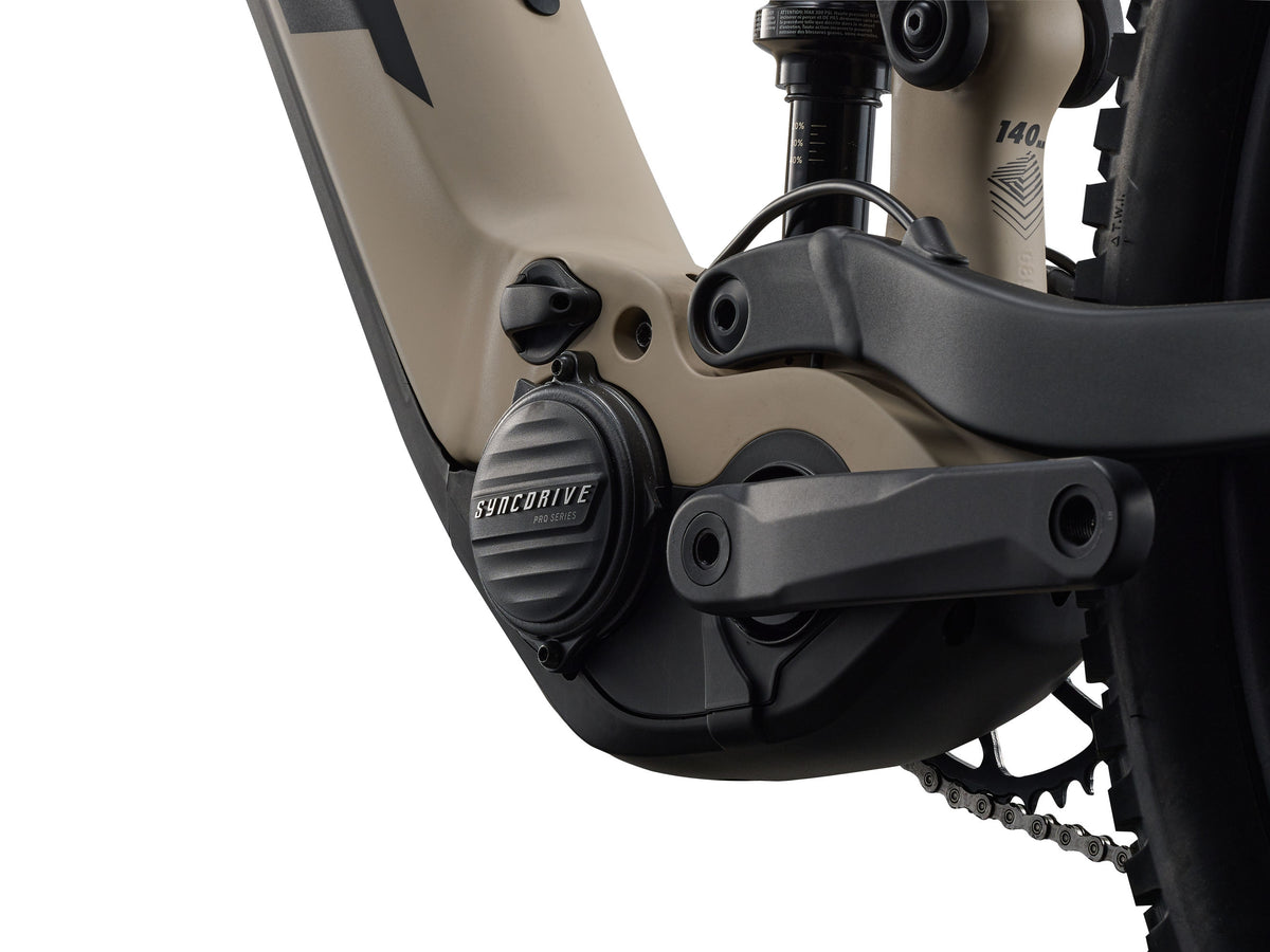 Close-up of a bicycle's gear system with SyncDrive branding on a white background
