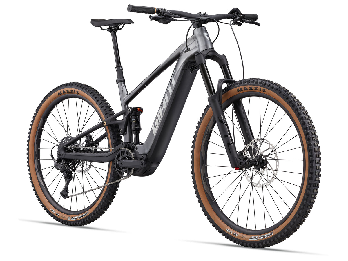 Mountain bike with Maxxis tires on a white background