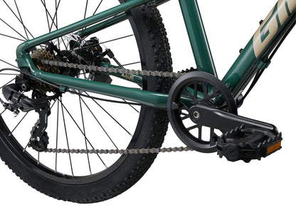 Close-up of a bicycle chain and gear system on a white background