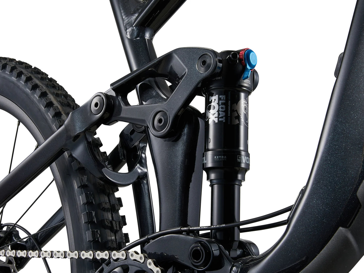 Close-up of a bicycle suspension fork with visible branding on a white background