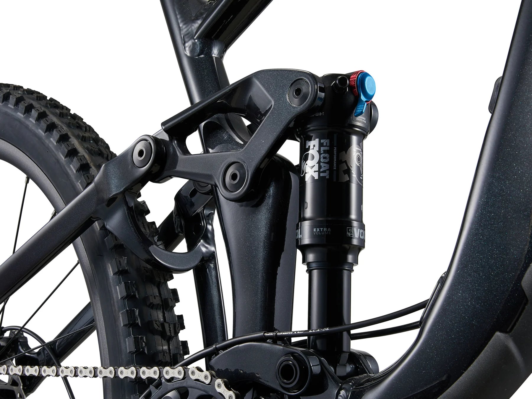 Close-up of a bicycle suspension fork with visible branding on a white background