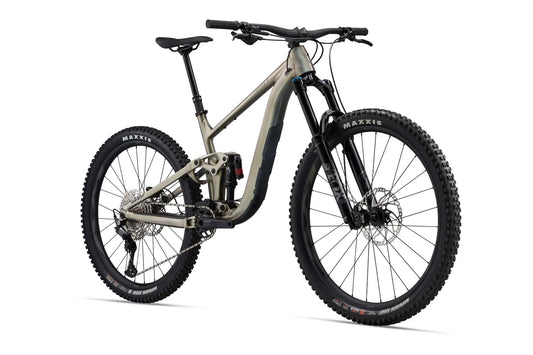 Mountain bike with a beige frame and black components on a white background