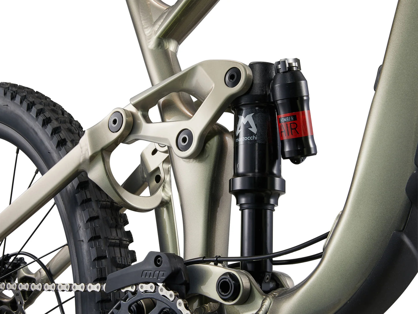 Close-up of a bicycle suspension fork with a brand logo on a white background