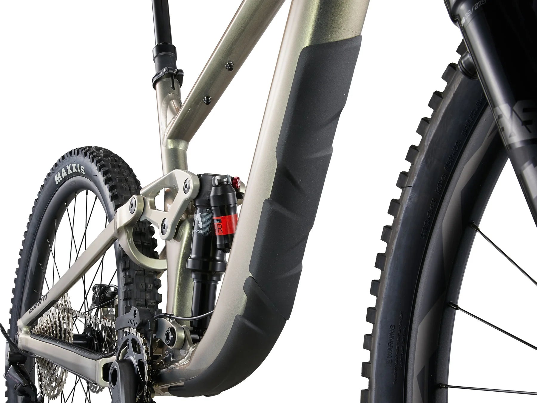 Close-up of a bicycle's suspension fork and wheel on a white background