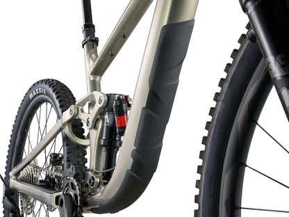 Close-up of a bicycle's suspension fork and wheel on a white background