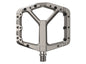 Metallic bicycle pedal on a white background