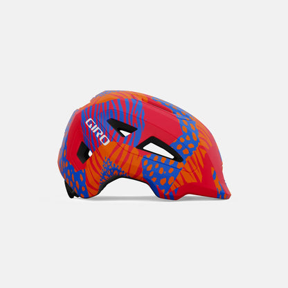 Colorful helmet with a red and blue pattern on a light gray background