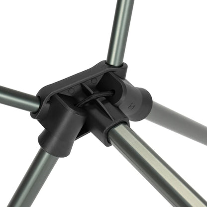 Close-up of a tripod with gray metal legs and black plastic joints on a white background.