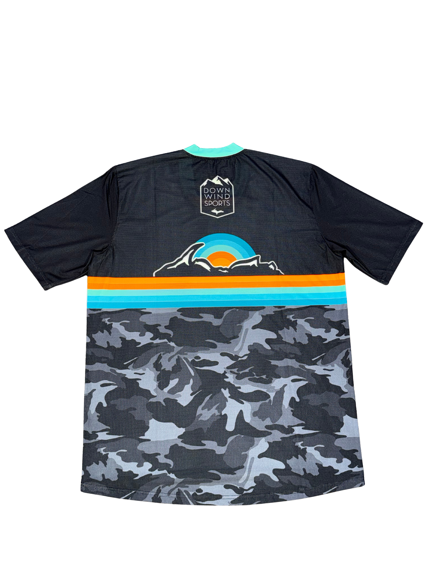 A short-sleeve athletic jersey shown from the back, featuring a dark navy upper section with a mountain and sunset graphic, a horizontal stripe band in teal, orange, and light blue, and a gray and black camouflage pattern on the lower half. The brand 'DOWN WIND SPORTS' is printed on the back neck patch.