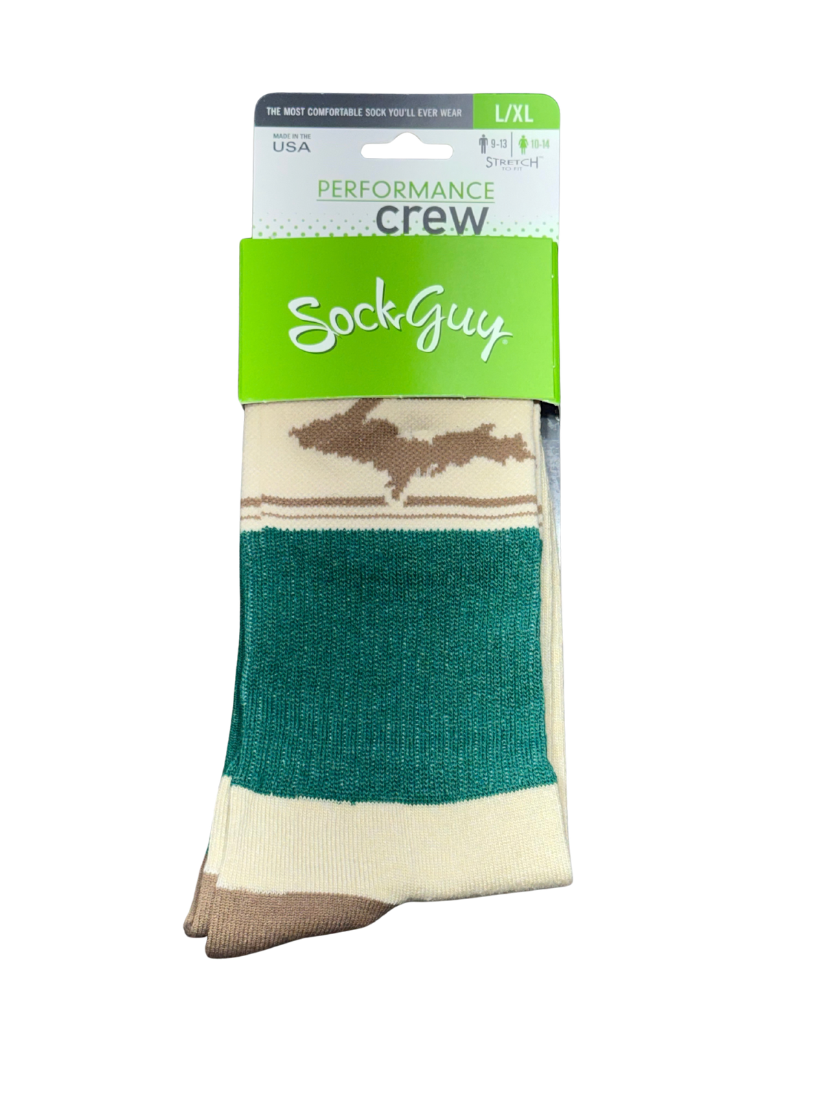 A packaged pair of crew socks from Sock Guy, featuring a green and white header card with 'PERFORMANCE crew' and 'SockGuy' branding. The socks have a cream base with a brown silhouette graphic and a prominent dark green stripe.
