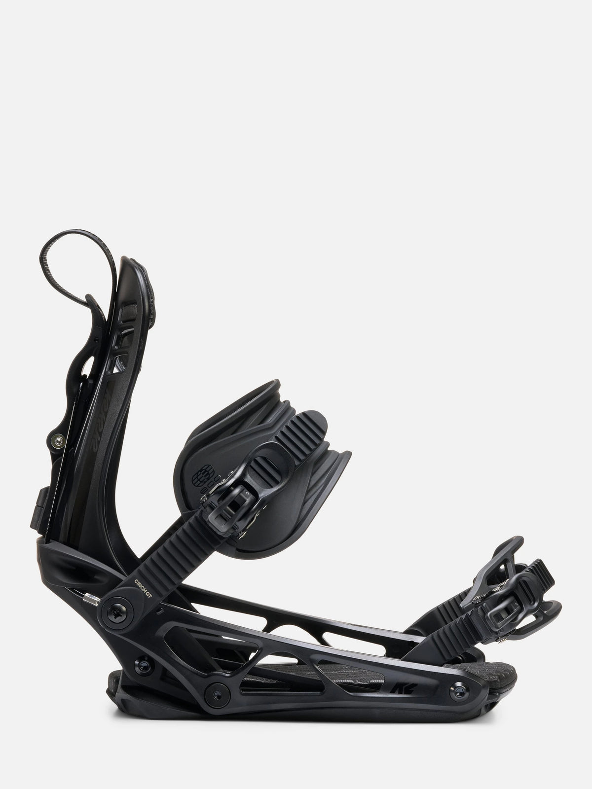 A single black snowboard binding shown in profile against a clean, light gray studio background.