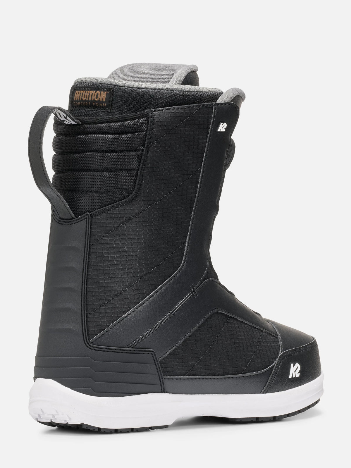 A black snowboard boot with a white sole, featuring a textured synthetic upper, a gray inner collar, and a white logo on the toe area, shown against a light gray background.