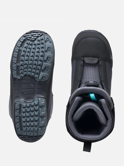 A pair of dark gray and black snowboard boots shown from the top, displaying both the side profile with a small turquoise accent tab and the treaded outsole.