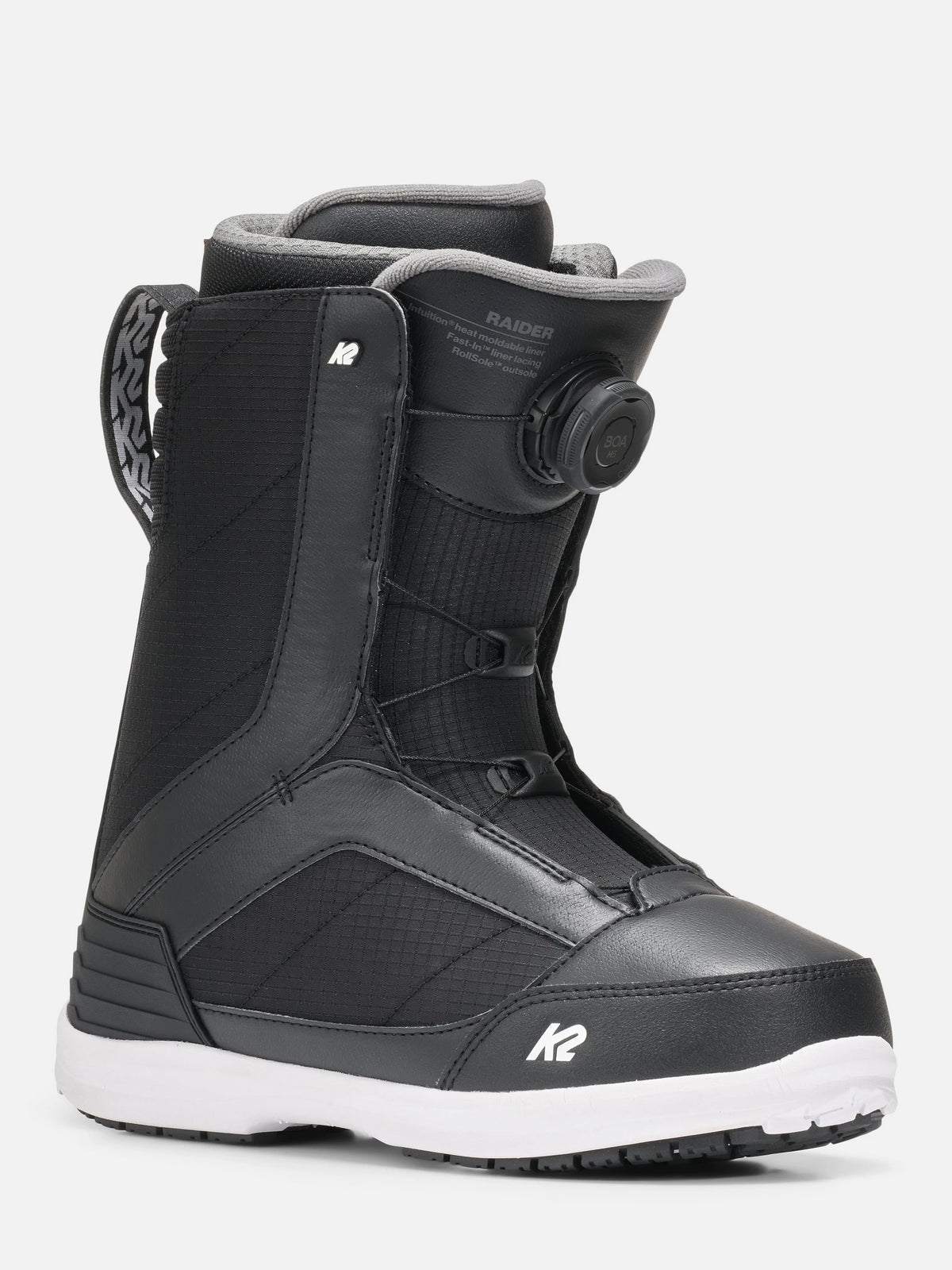 A black K2 Raider snowboard boot with a white sole, featuring a BOA dial closure system and a white K2 logo on the toe, shown against a light gray background.