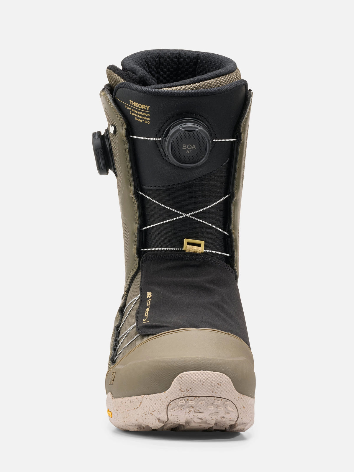 A single snowboard boot shown from the front on a light gray background. The boot is primarily black with olive green panels, a beige toe and sole, and gold accents including a dial closure and branding.