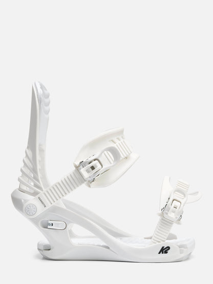 A single white snowboard binding shown from a side profile view against a clean, light gray studio background. The binding features a molded base with an adjustable strap and a prominent heel.