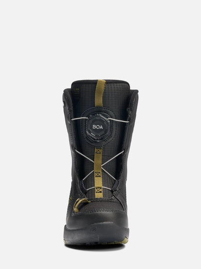 A single black snowboard boot with gold accents and a BOA dial closure system, shown from the back against a light gray background.