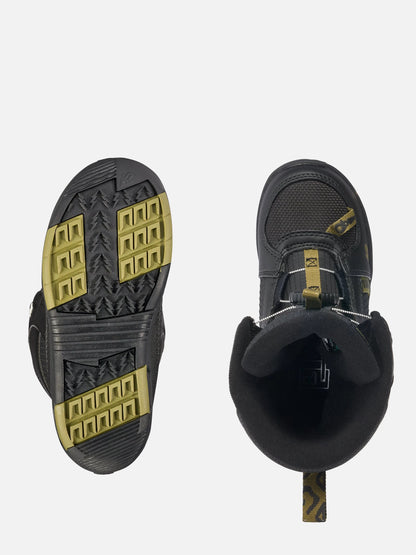 A pair of black high-top winter boots shown from the top, displaying the textured treaded outsole on the left and the boot's interior with a black cuff on the right, both featuring gold accents.