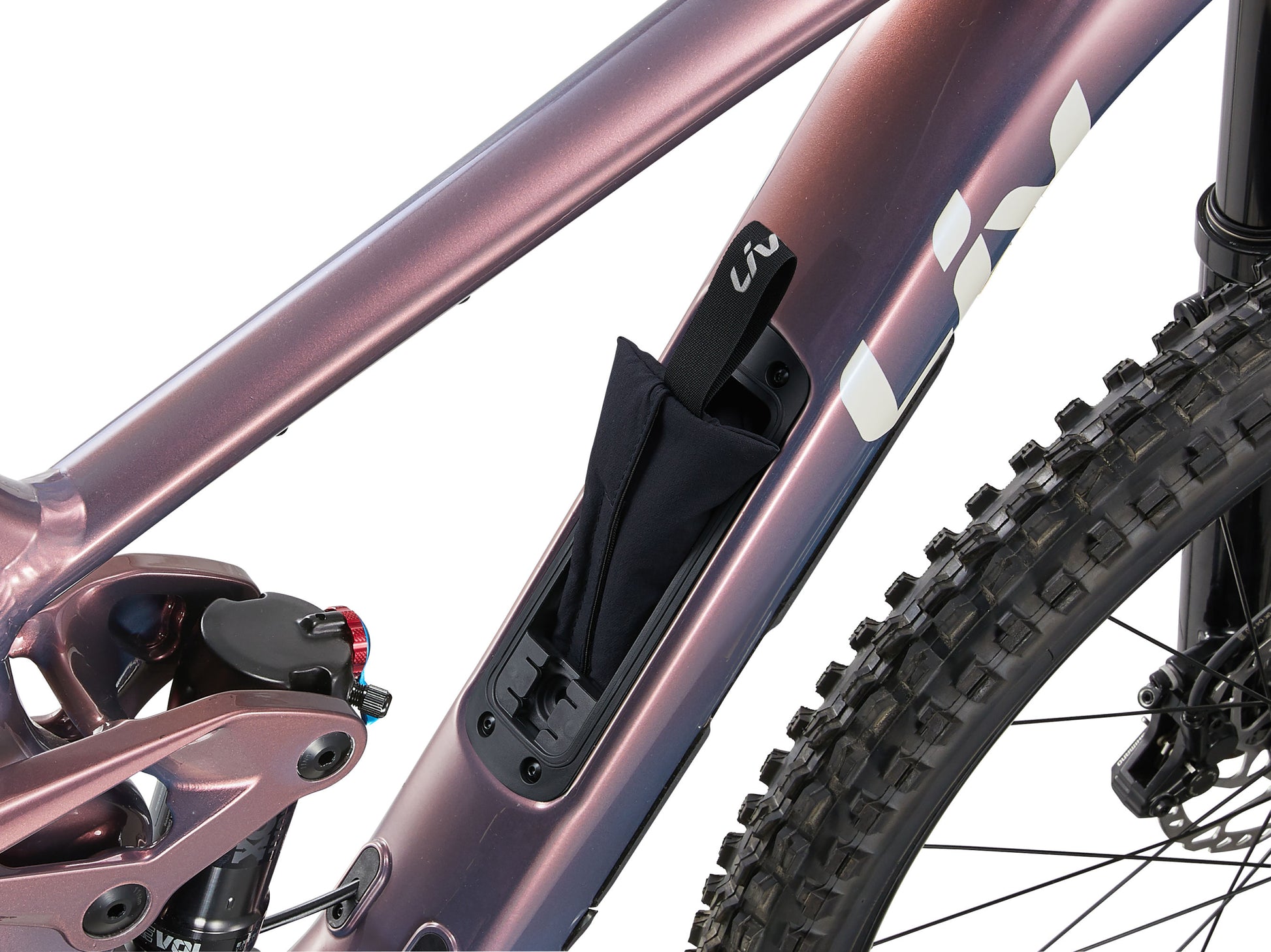 Close-up of a bicycle frame with a black bag attached on a white background
