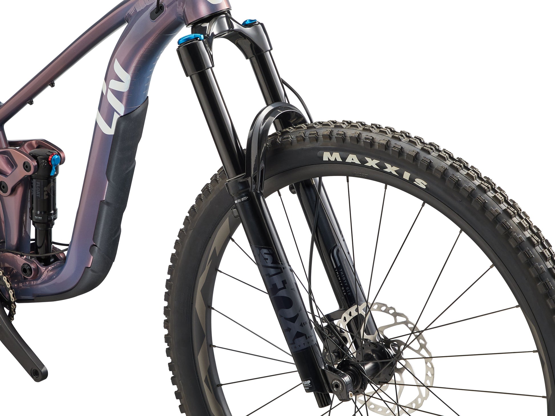 Close-up of a mountain bike with Maxxis tire on a white background