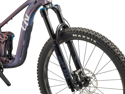 Close-up of a mountain bike with Maxxis tire on a white background