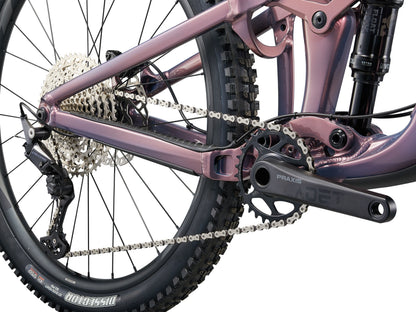 Close-up of a bicycle's chain and gear system on a white background