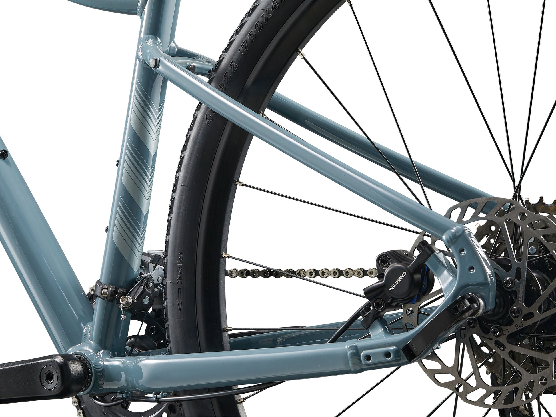 Close-up of a bicycle's chain and gear system on a white background