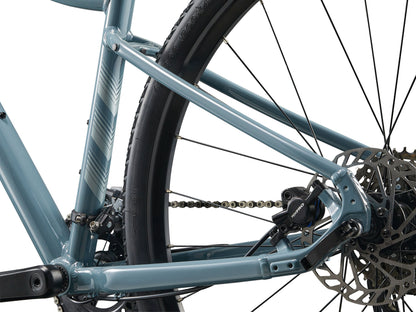 Close-up of a bicycle's chain and gear system on a white background