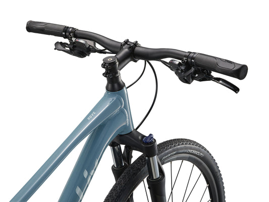 Close-up of a bicycle handlebar with a blue frame on a white background