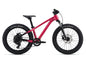 Pink children's bike with black tires on a white background
