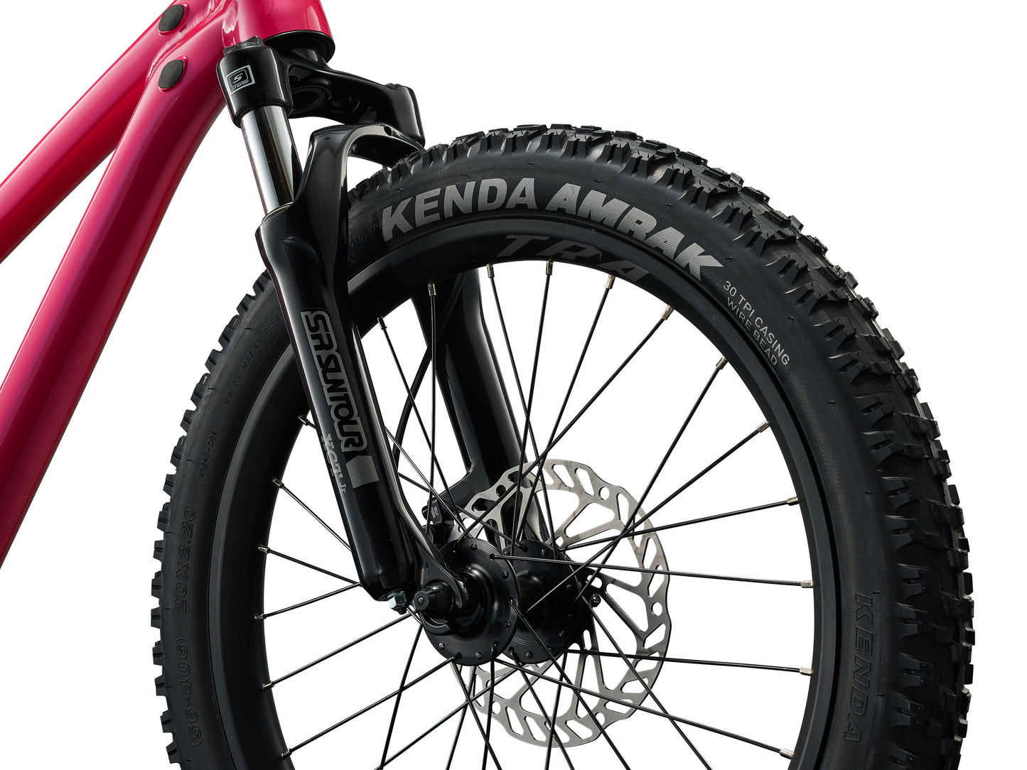 Close-up of a bicycle wheel with Kenda Ambra tire on a white background