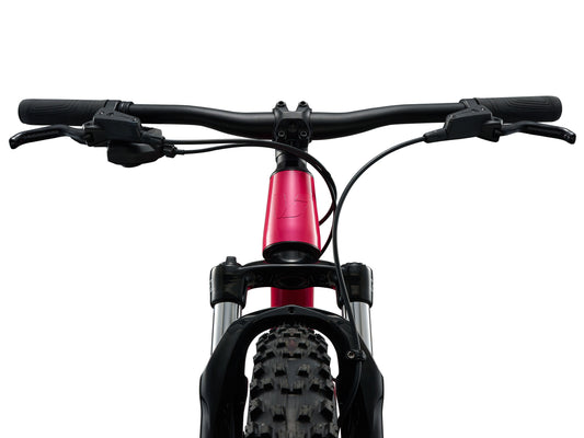 Close-up of a bicycle handlebar with a white background