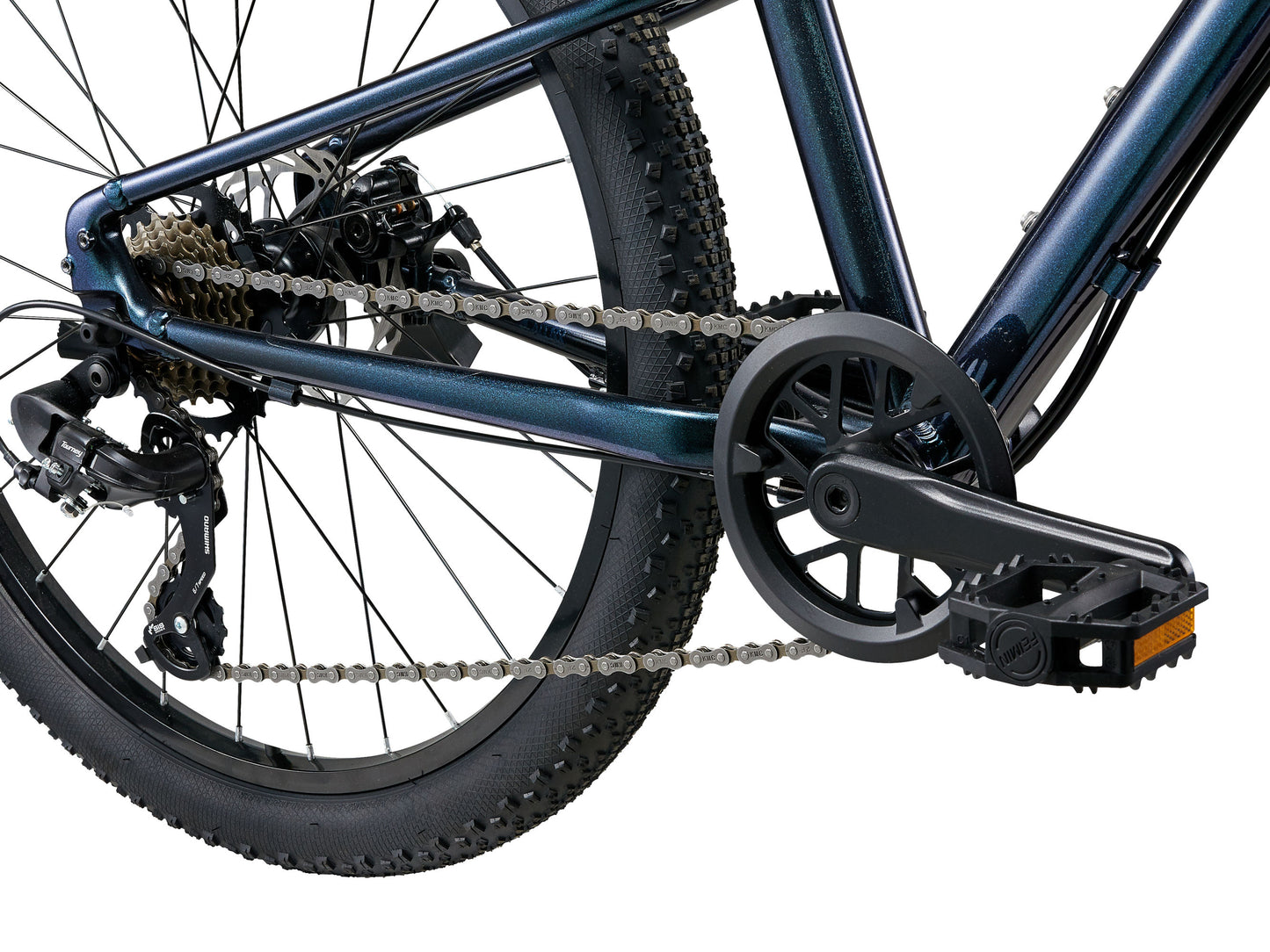 Close-up of a bicycle chain and gear system on a white background