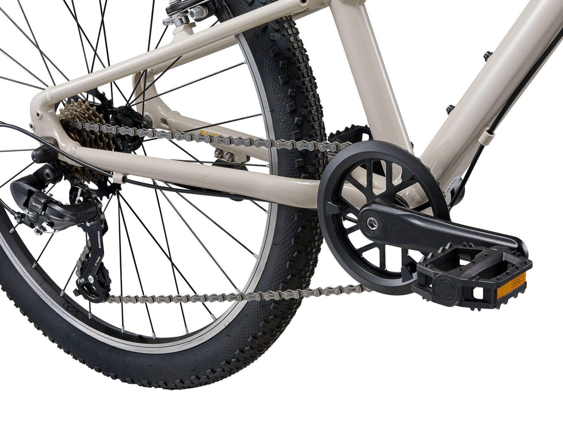 Close-up of a bicycle chain and gear system on a white background