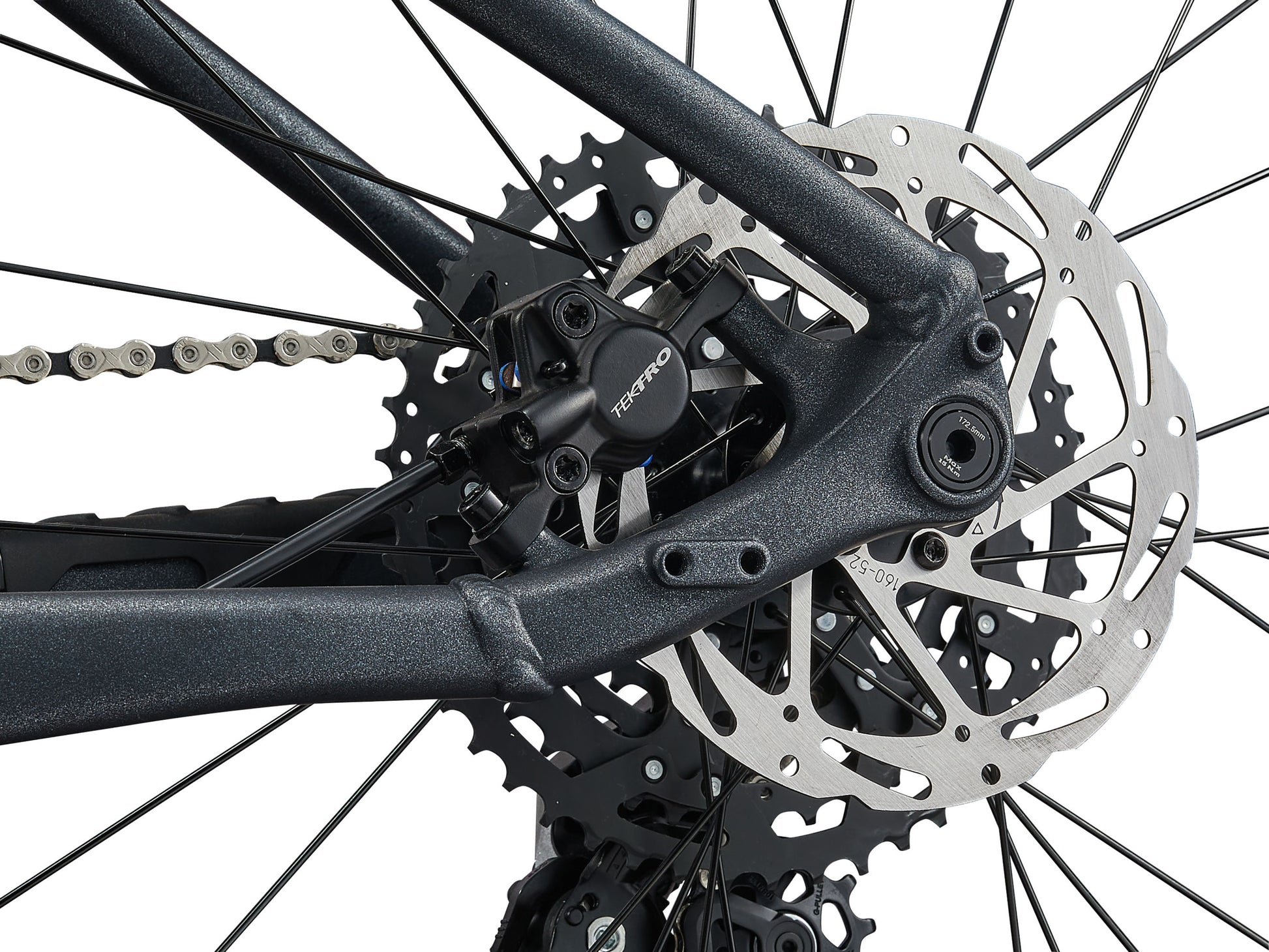 Close-up of a bicycle's gear system with a white background