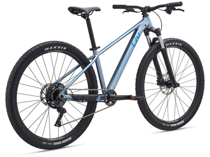 Mountain bike with Maxxis tires on a white background
