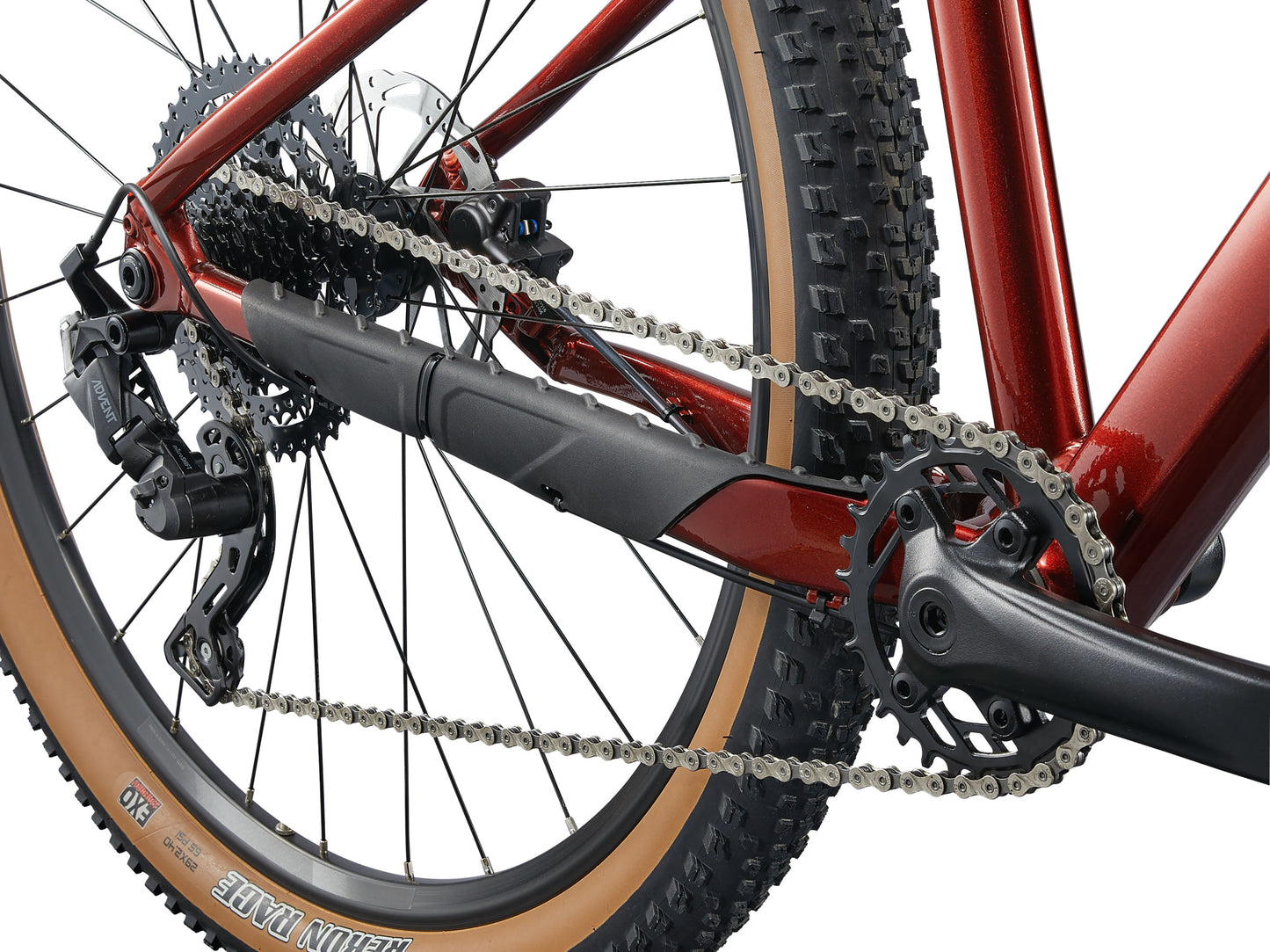 Close-up of a bicycle chain and gear system on a white background
