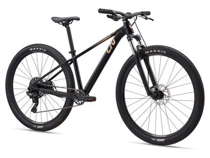 Black mountain bike with Maxxis tires on a white background