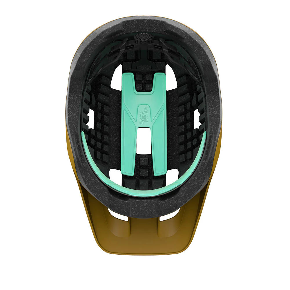 Close-up of a helmet interior with green strap and black padding on a white background