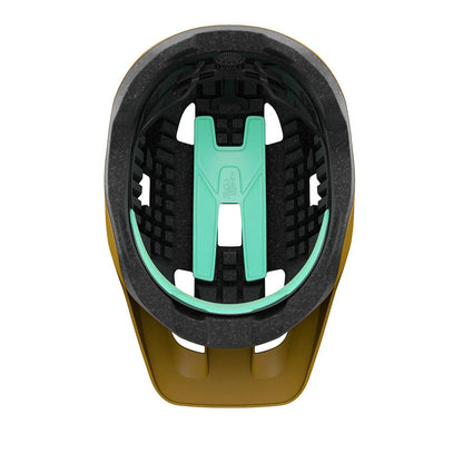 Close-up of a helmet interior with green strap and black padding on a white background