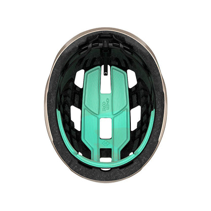 Close-up of a helmet interior with green padding on a white background