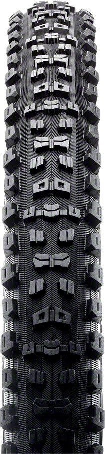 Tire with tread pattern on a black background