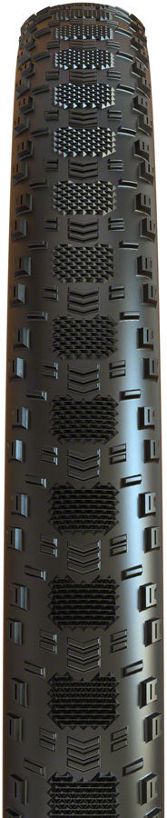Close-up of a tire tread pattern with detailed texture