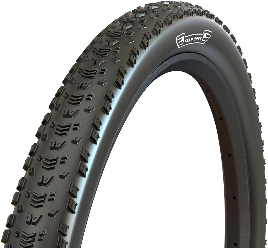 Close-up of a bicycle tire with tread pattern on a white background