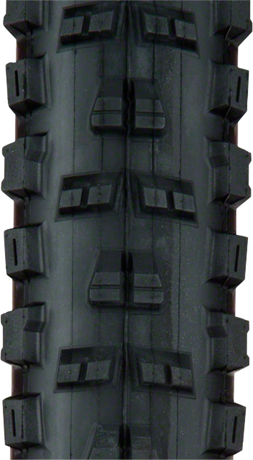 Close-up of a black off-road tire tread pattern