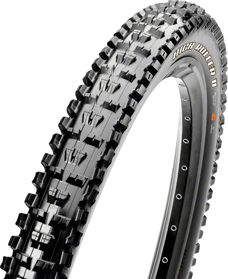 Bicycle tire with knobby tread pattern on a white background