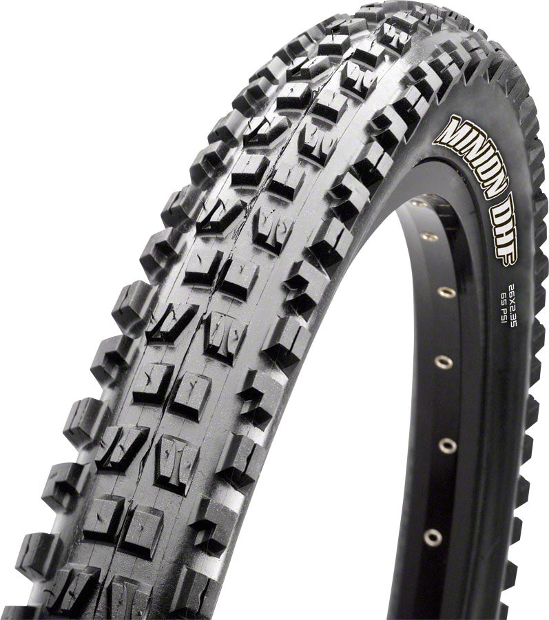 Close-up of a bicycle tire with tread pattern on a white background