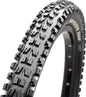 Close-up of a bicycle tire with tread pattern on a white background